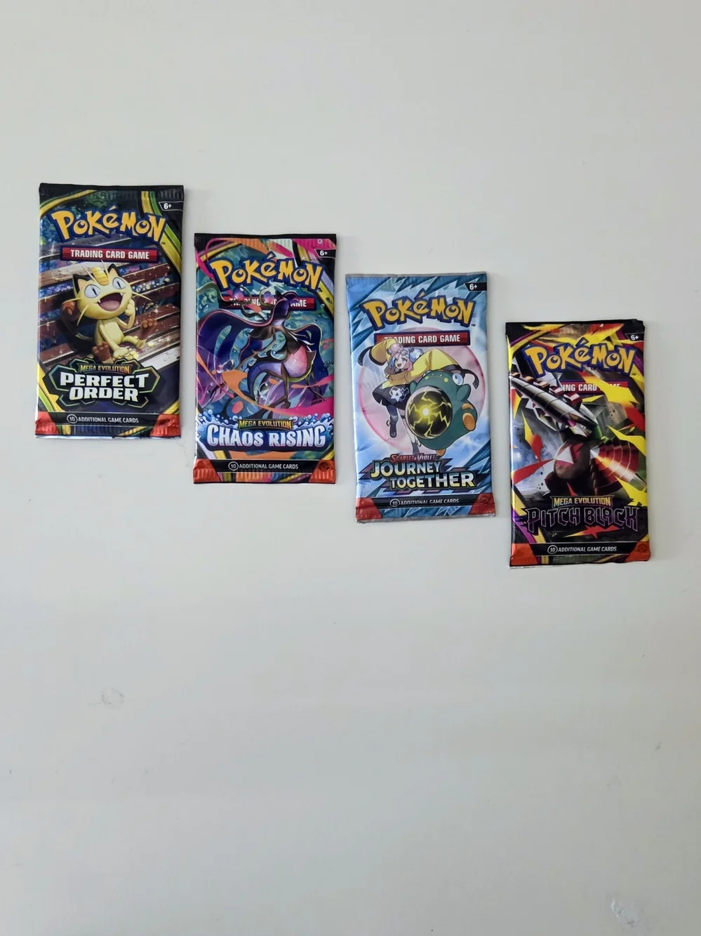 Pokémon TCG Pitch Black, Chaos Rising, Perfect Order & Journey Together